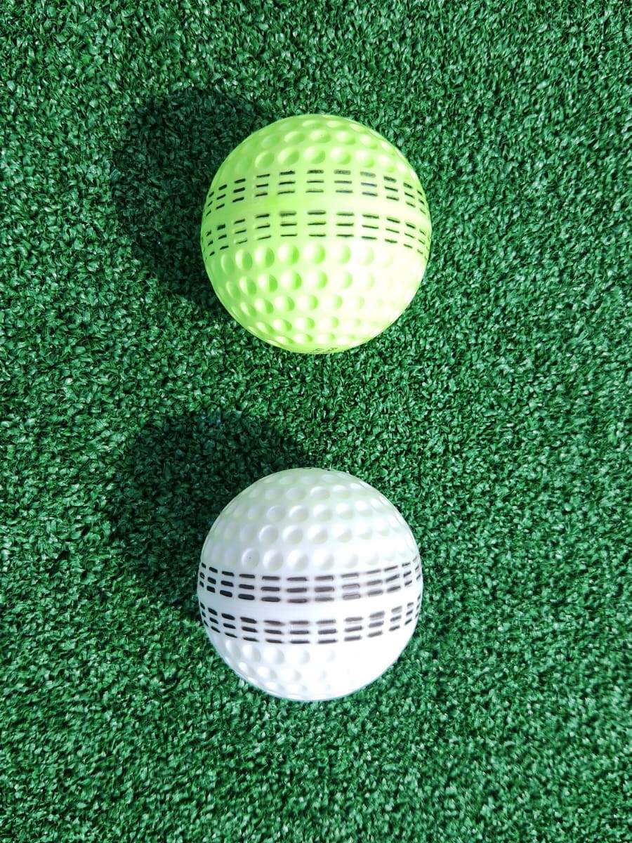 Luminous green and white bowling-machine cricket balls provided at the Cricket Pod Luminous green and white bowling-machine cricket balls provided at the Cricket Pod