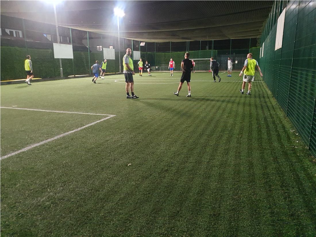 Evening football session under floodlights at Willen Lake Evening football session under floodlights at Willen Lake