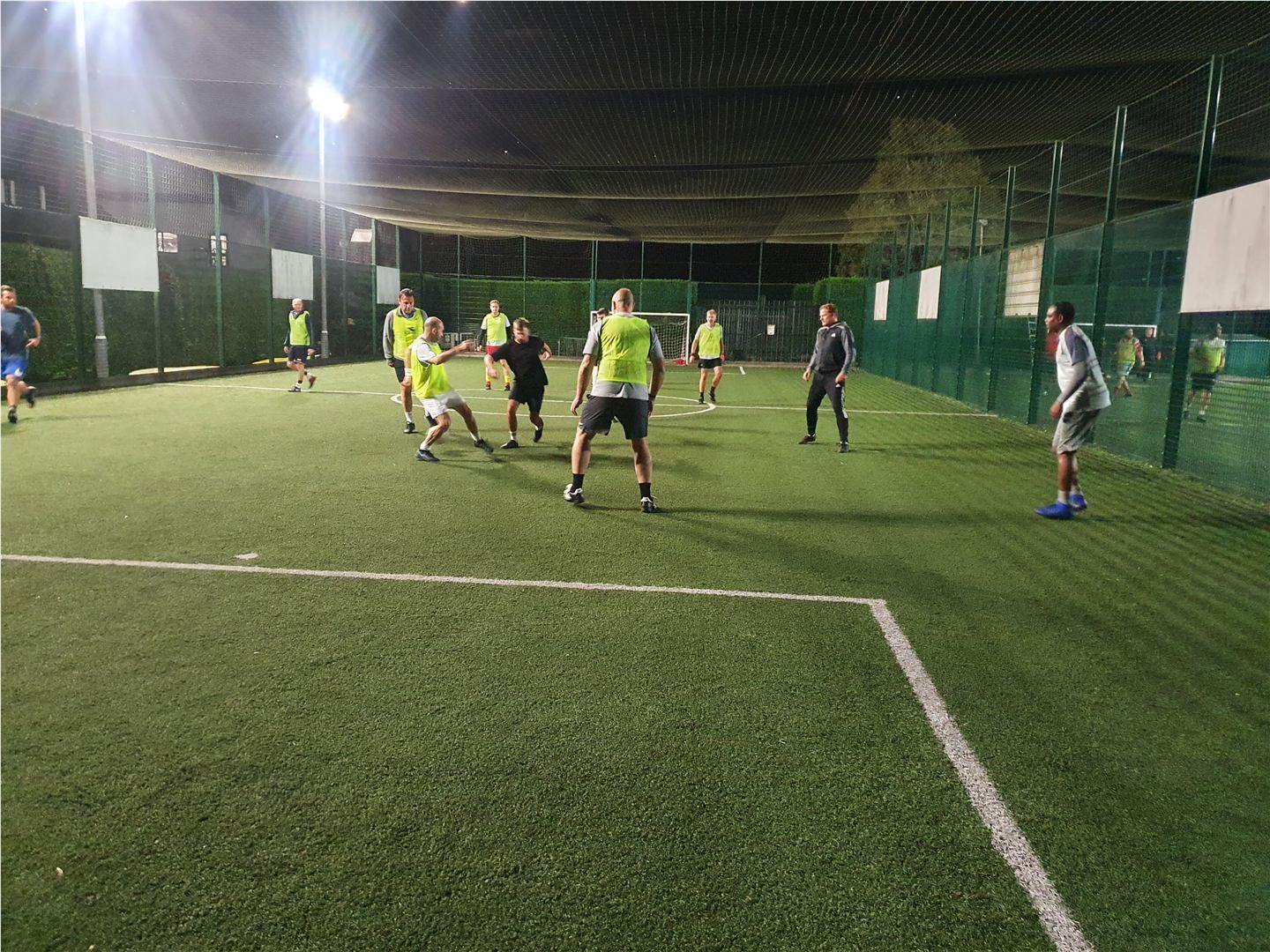 Five-a-side football match under floodlights at Willen Lake in Milton Keynes Five-a-side football match under floodlights at Willen Lake in Milton Keynes
